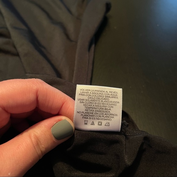 Black Covington polyester stretch tank top with beaded design on shoulder - Picture 3 of 7